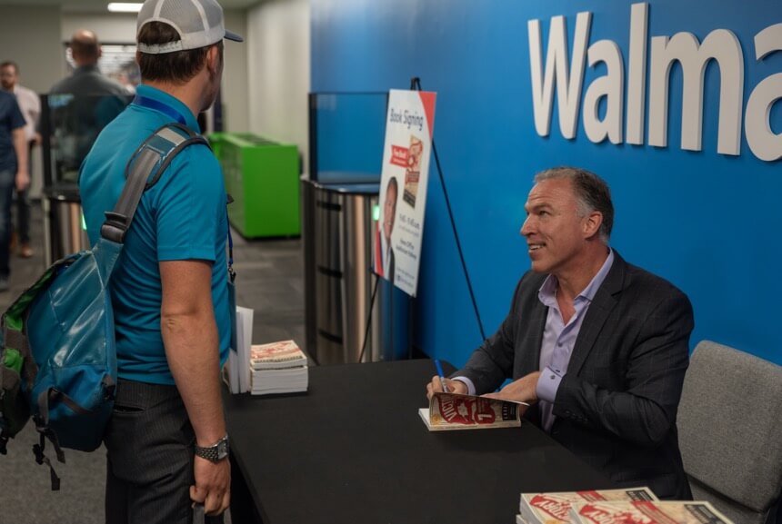 Larry-Broughton-signing-VICTORY-books-and-engaging-with-people